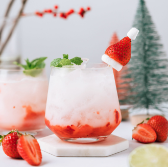 Festive Christmas cocktail with strawberries